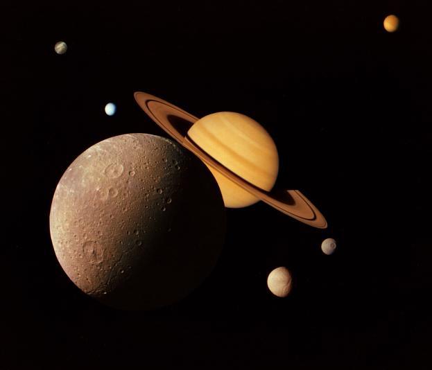 NASA's Cassini Finds Saturn's Rings Coat Tiny Moons