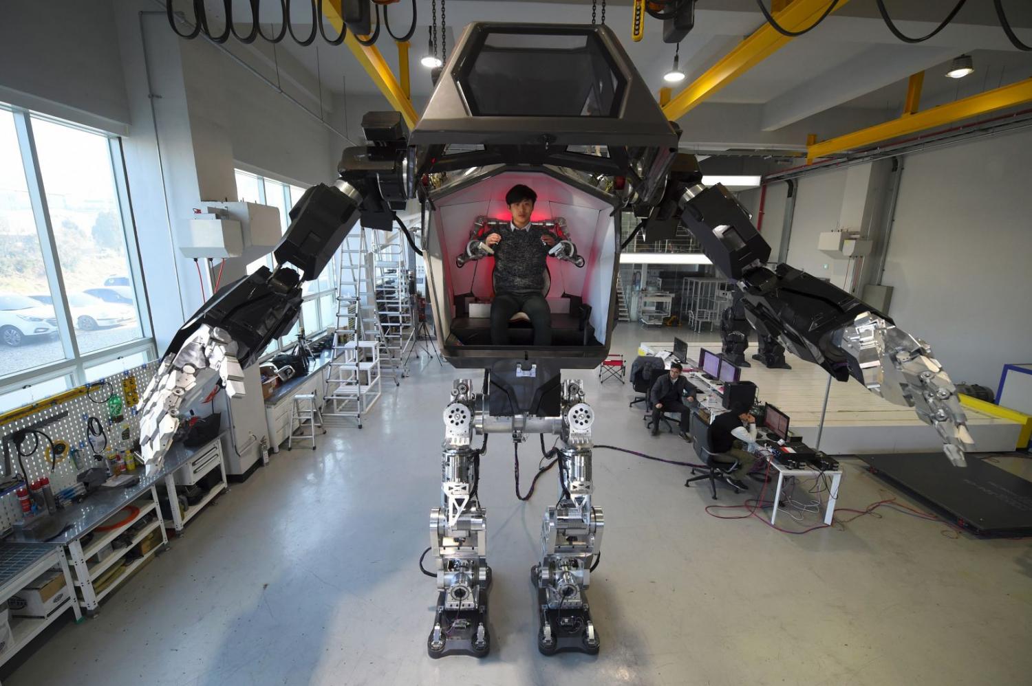 Avatarstyle S Korean manned robot takes first baby steps