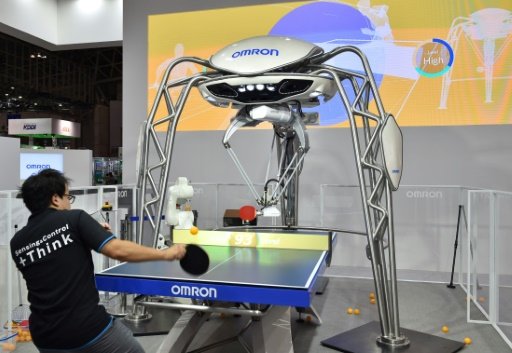 exciting Shopkeeper Out Smash hit: Ping pong robot takes on Olympian at Tokyo tech fair