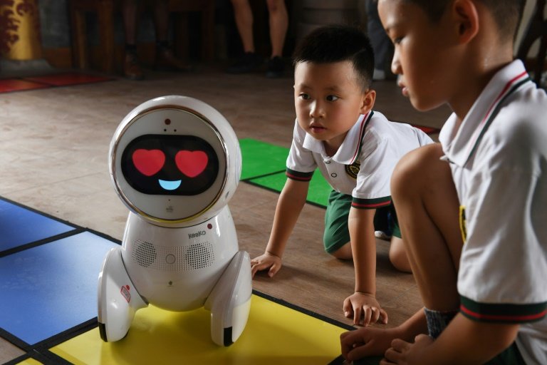 Robot Teachers Invade Chinese Kindergartens