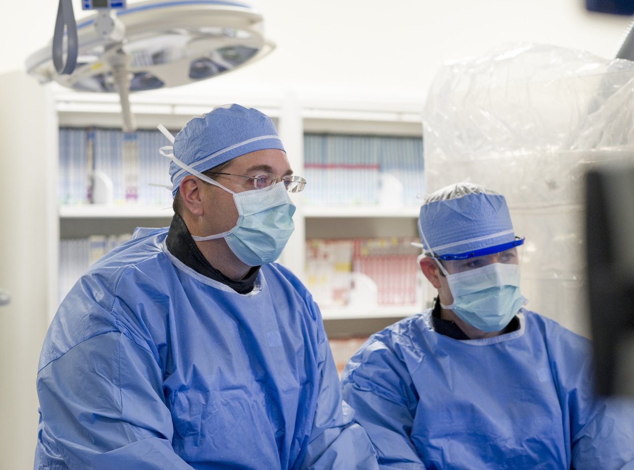 MUSC Health neurosurgeon Dr. Raymond D. Turner (left)