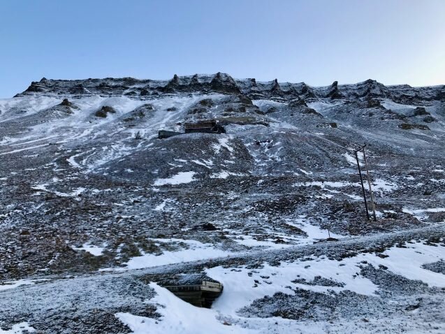 Melting glacier floods Arctic coal mine, highlighting climate change irony - Phys.org