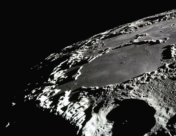 Research sheds light on the moon's dark craters - Phys.org