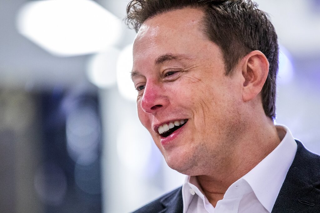 A Suit At A Beach Party, Well, Only Elon Musk Could Pull Of Such An  Outrageous