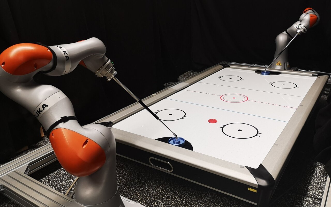 A policy enable the of general-purpose manipulators in high-speed robot air hockey