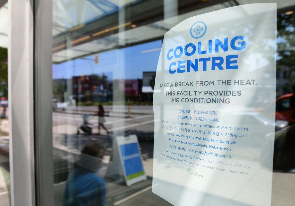 Canadians pack into cooling centers as heat wave death toll doubles