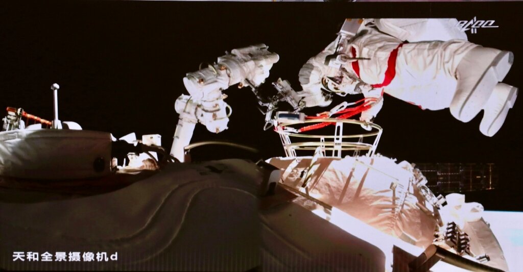 China's astronauts make spacewalk to upgrade robotic arm