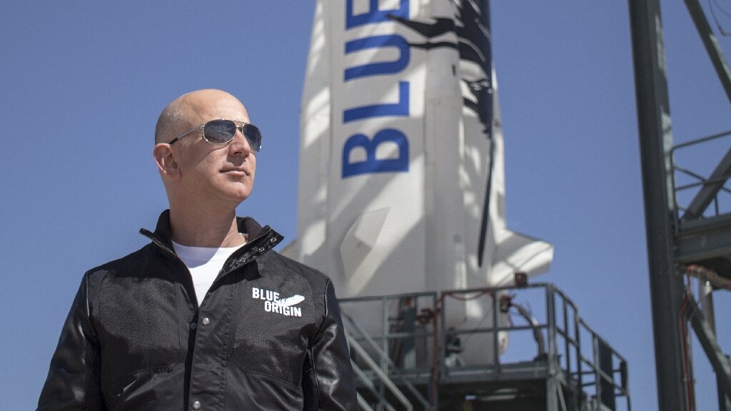 This April 24, 2015 handout photograph obtained courtesy of Blue Origin shows Jeff Bezos at New Shepard's West Texas launch faci