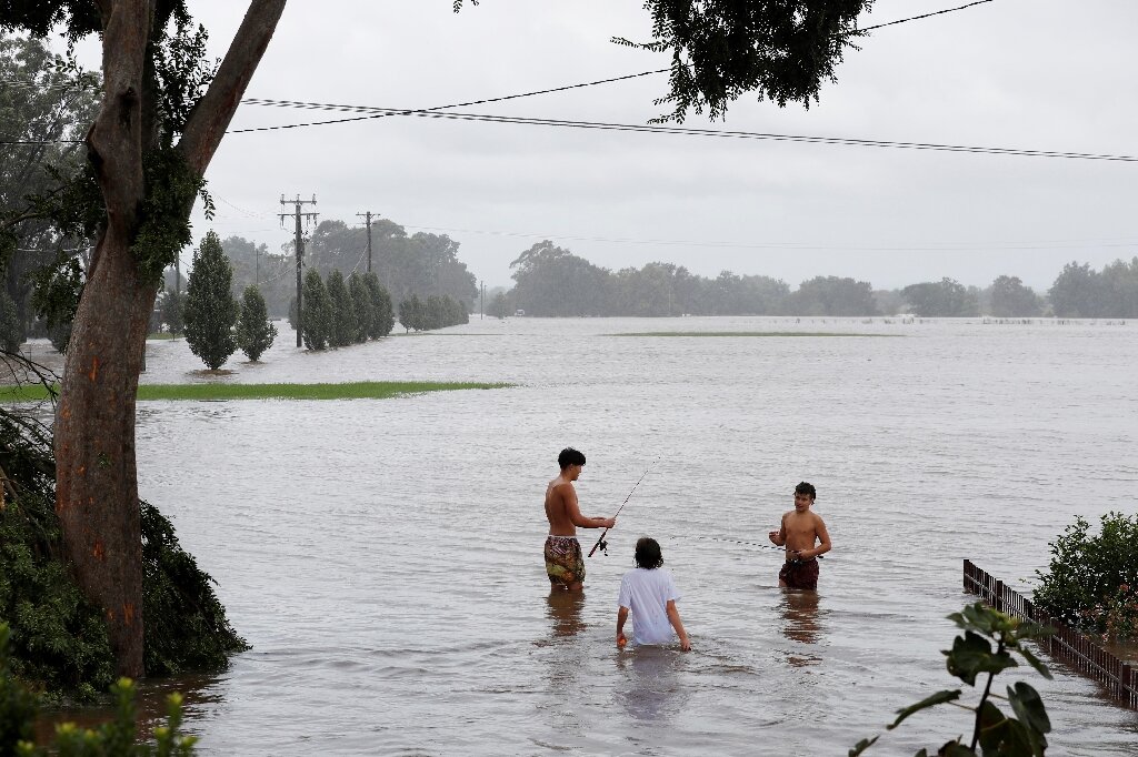 #Australia orders 200,000 to flee floods, city of Sydney spared