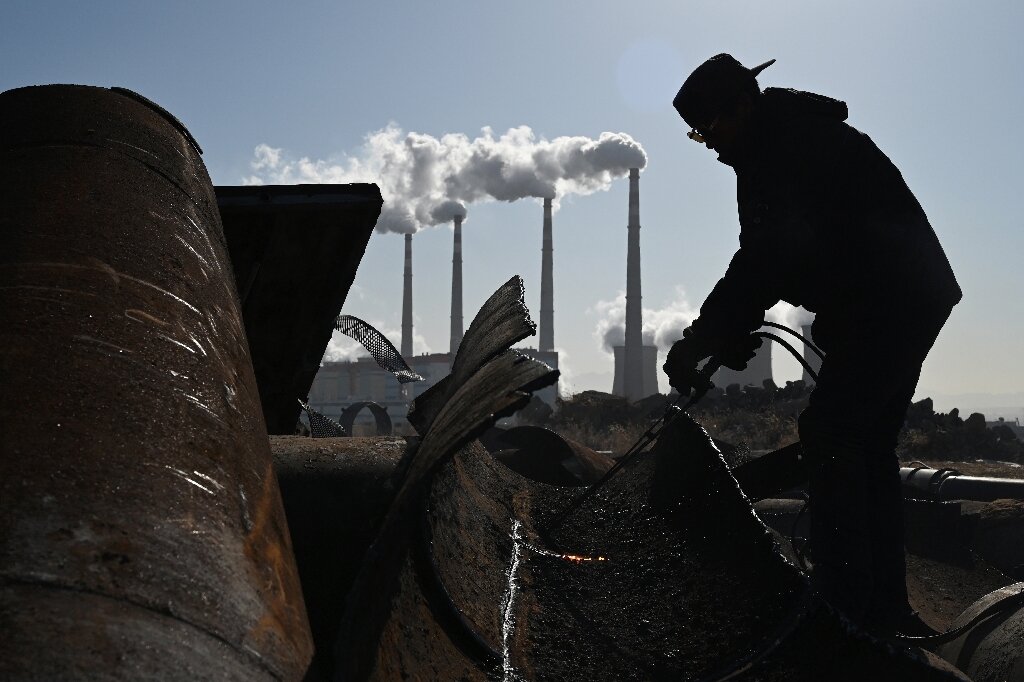 China macht Klimaversprechen rückgängig, da sich die Wirtschaft verlangsamt