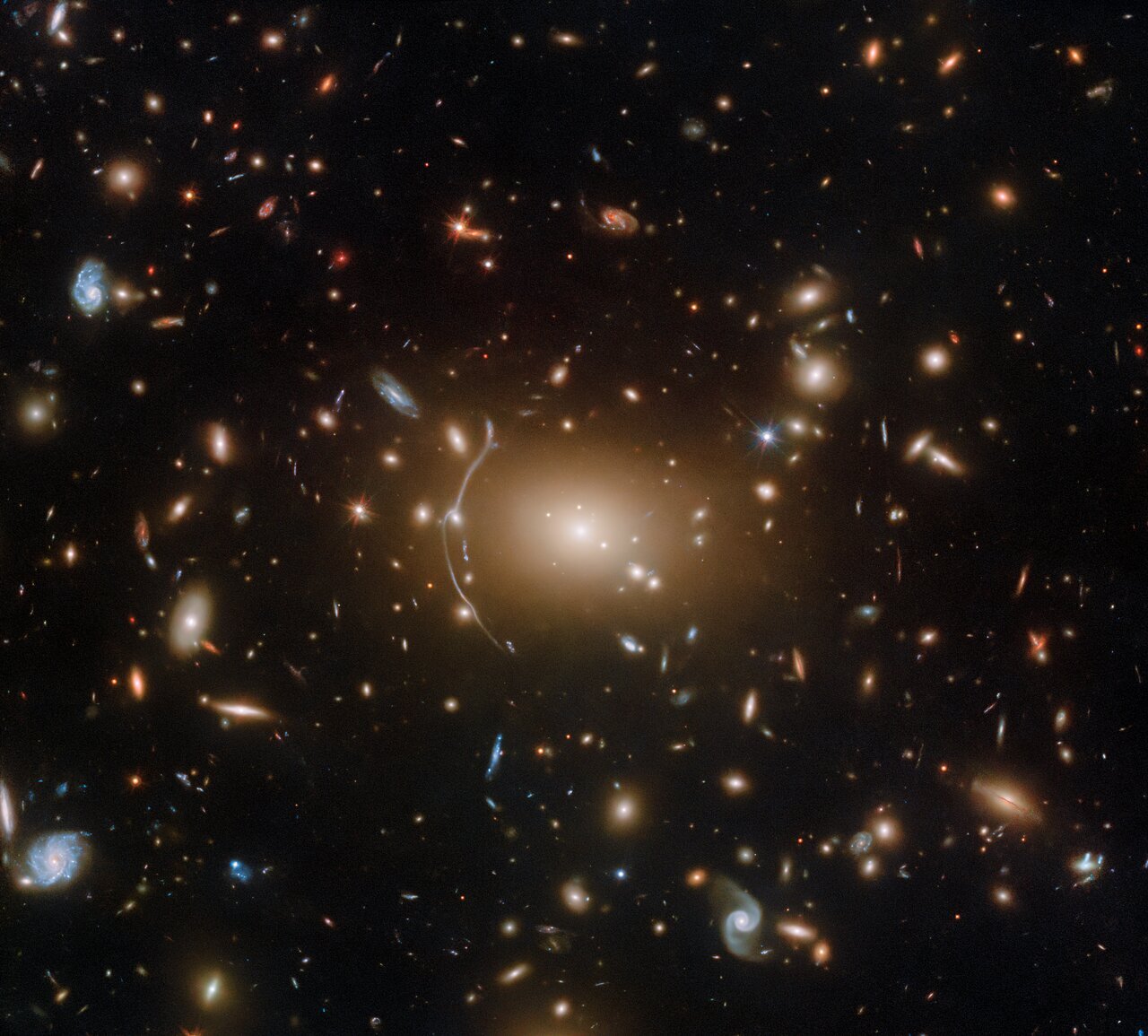 De Hubble-telescoop viert het spookachtige seizoen met Abell 611, een spinnenweb van sterrenstelsels bij elkaar gehouden door een mysterieus geheim.
