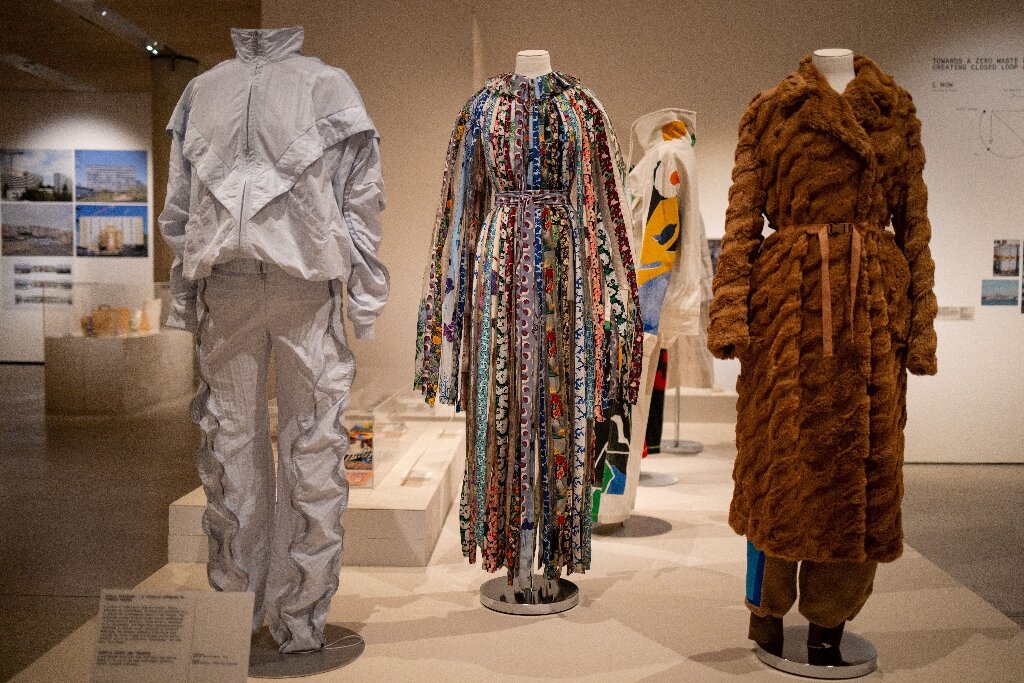 These clothes made from waste materials were designed by Stella McCartney and displayed at the exhibition "Waste Age: What