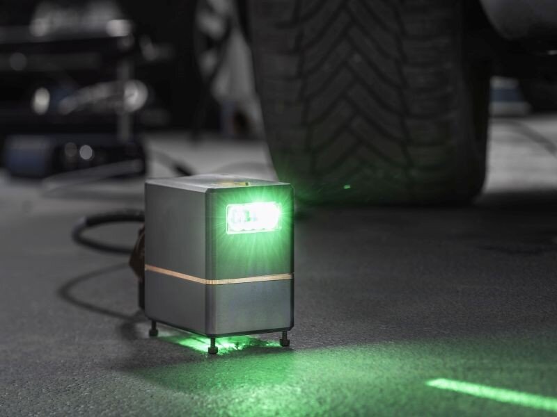Holographic ground projector lets autonomous cars communicate with  pedestrians