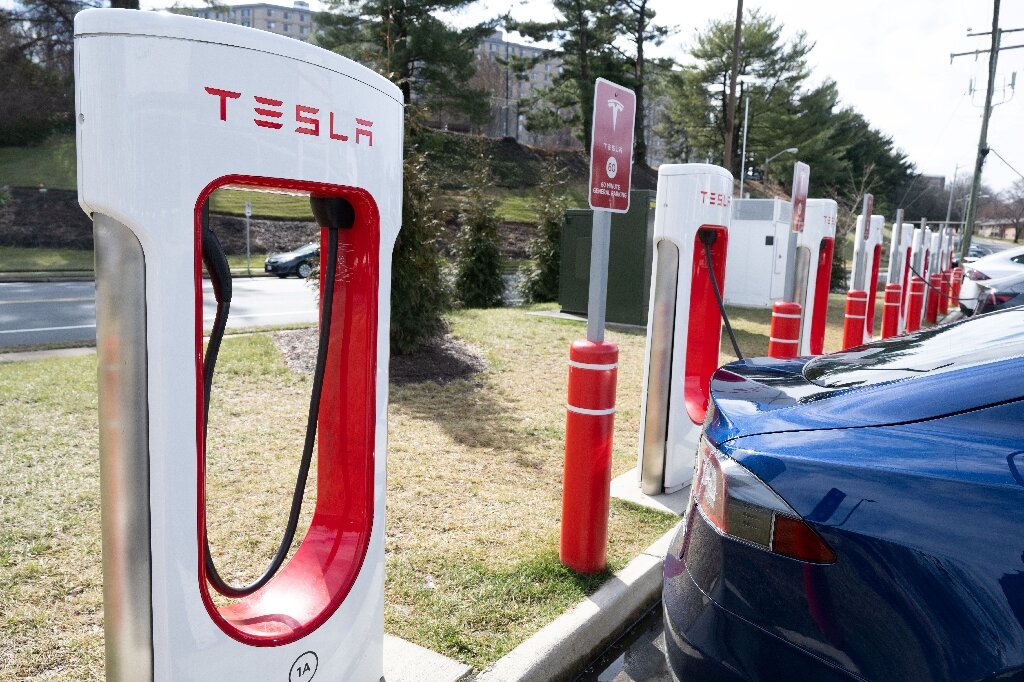 Strange bedfellows: auto rivals embrace Tesla EV chargers