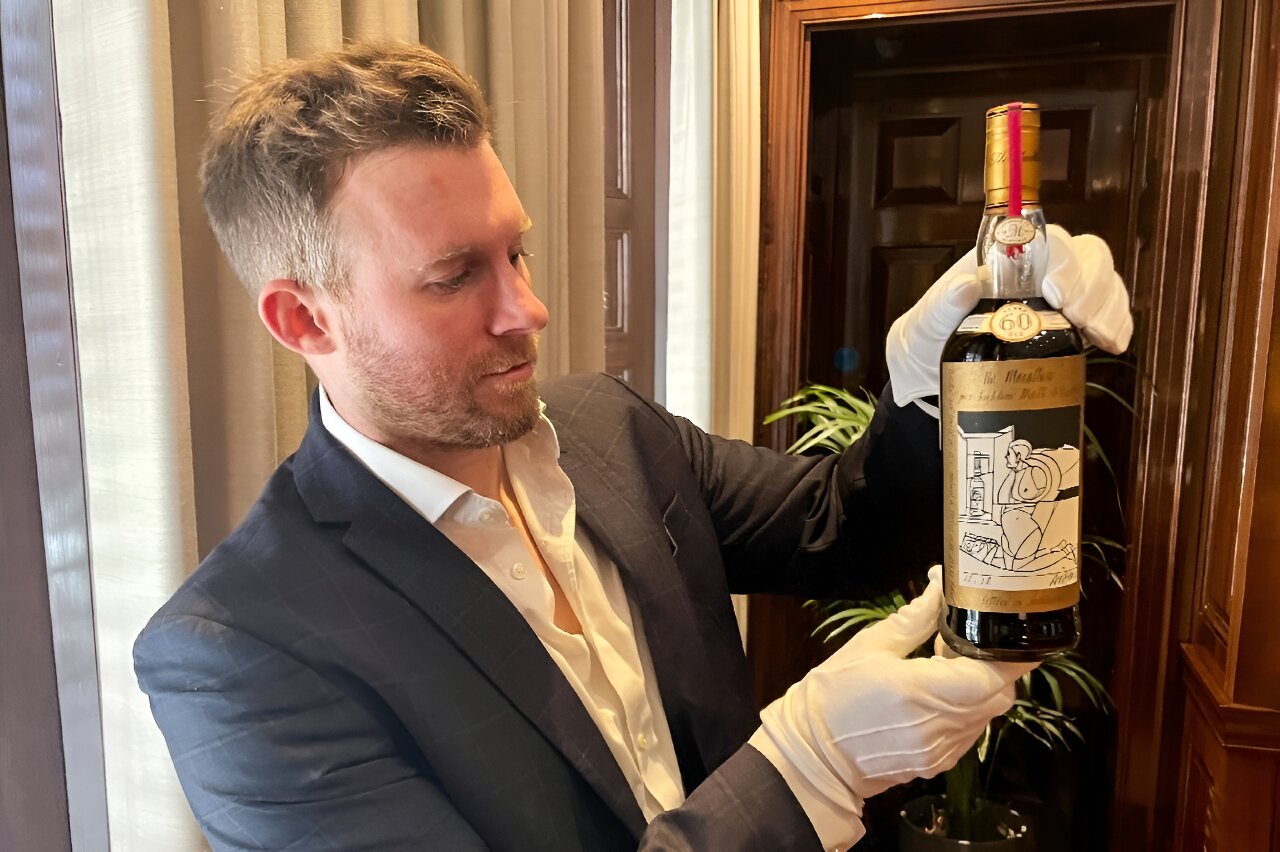 Record for world’s priciest bottle of whisky smashed at London auction