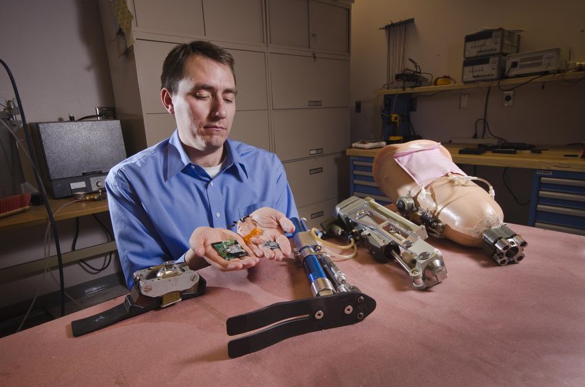 Expanded prosthetics and organ engineering. (Neural) prosthetics. Factory worker with prosthesis. Neural Engineering.