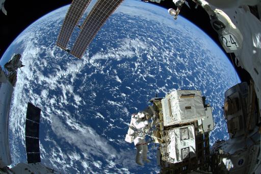 Alarm sends astronauts to shelter at space station (Update)
