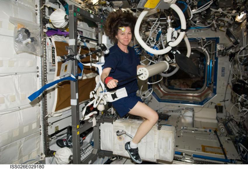 astronauts exercise in space