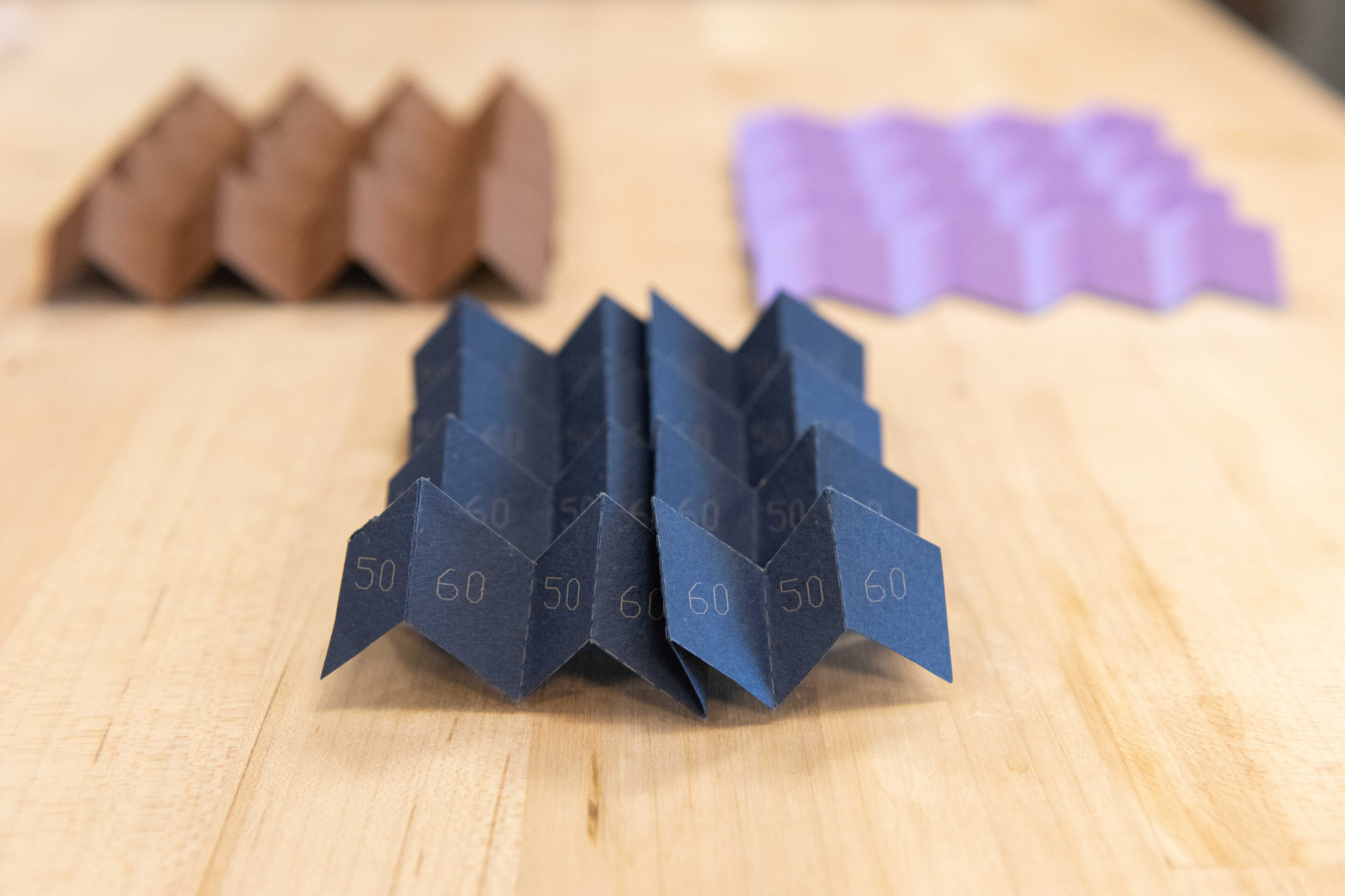 Origami: mathematics in creasing