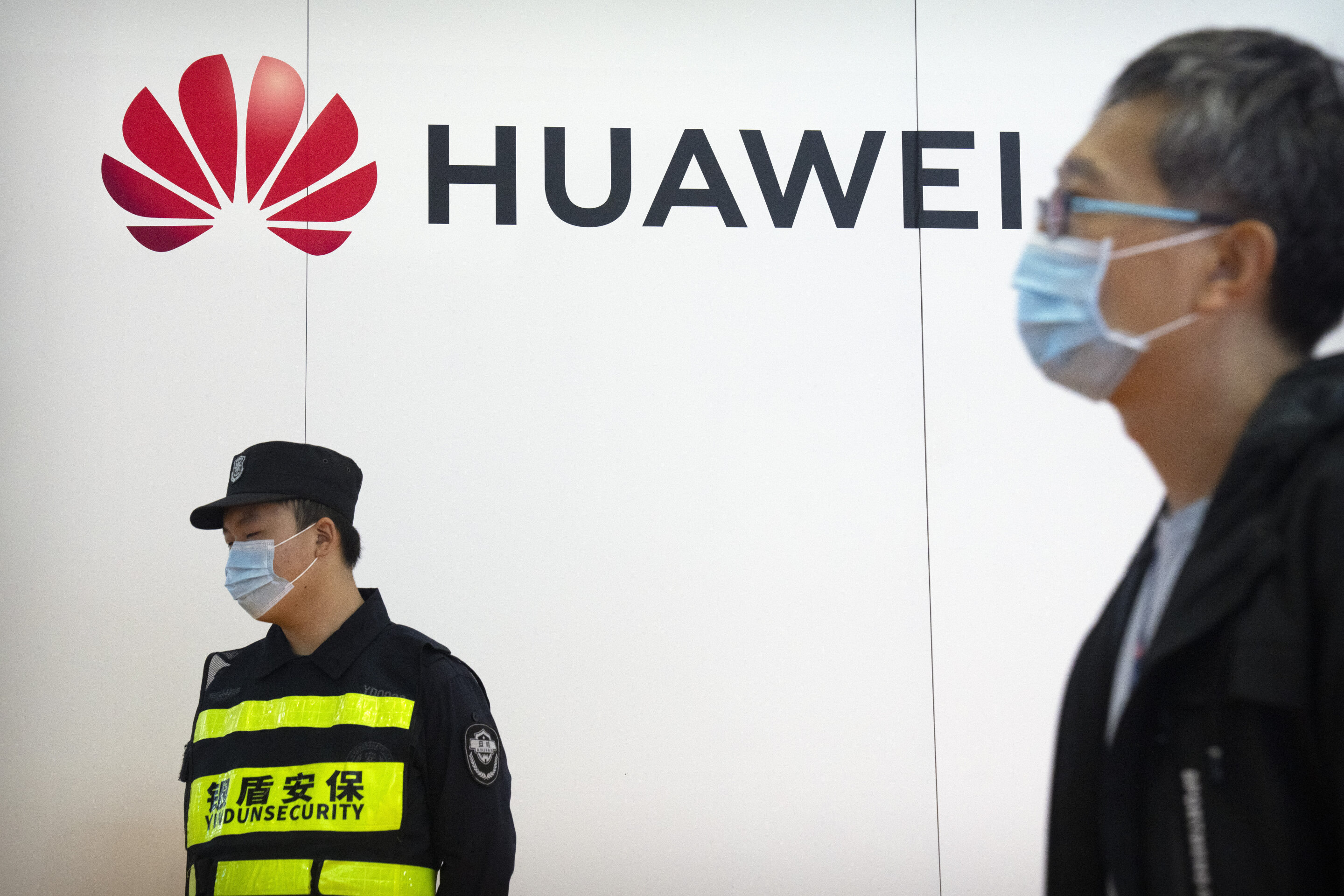 China’s Huawei says 2021 sales down, profit up