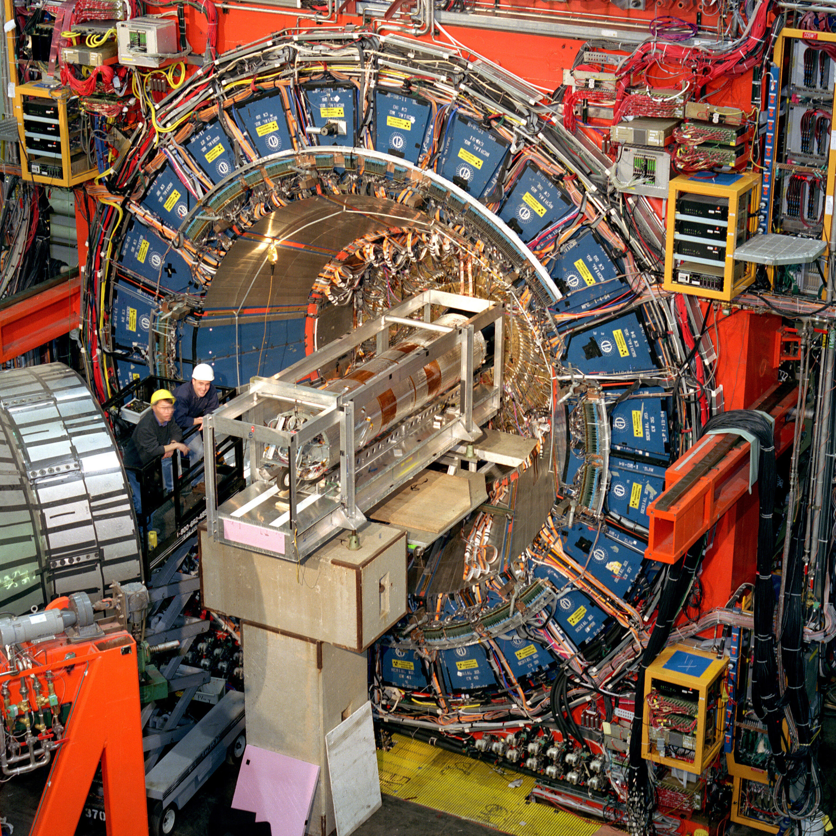 Key particle weighs in a bit heavy, confounding physicists