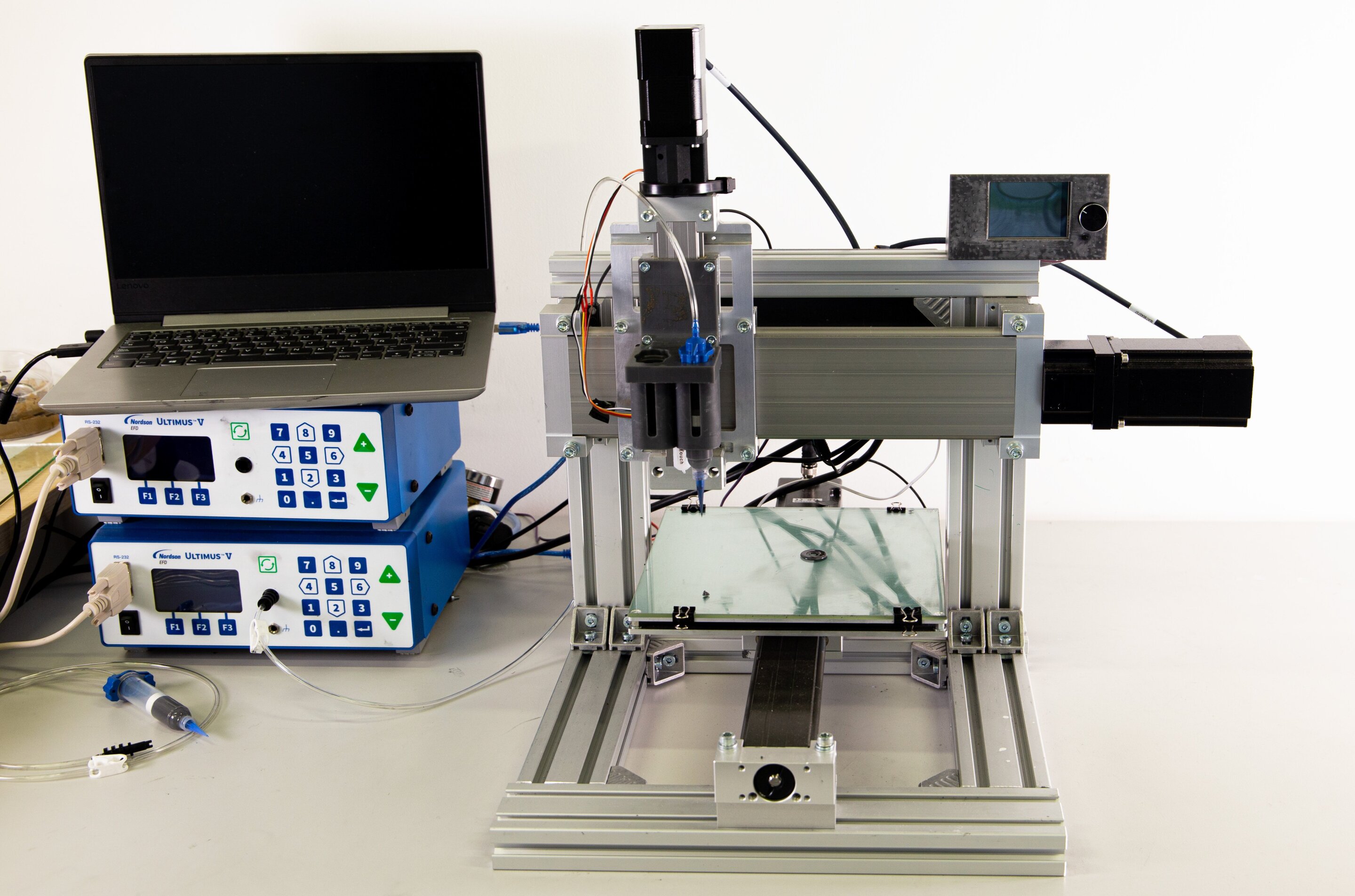 #A 4D printer for smart materials with magneto- and electro-mechanical properties