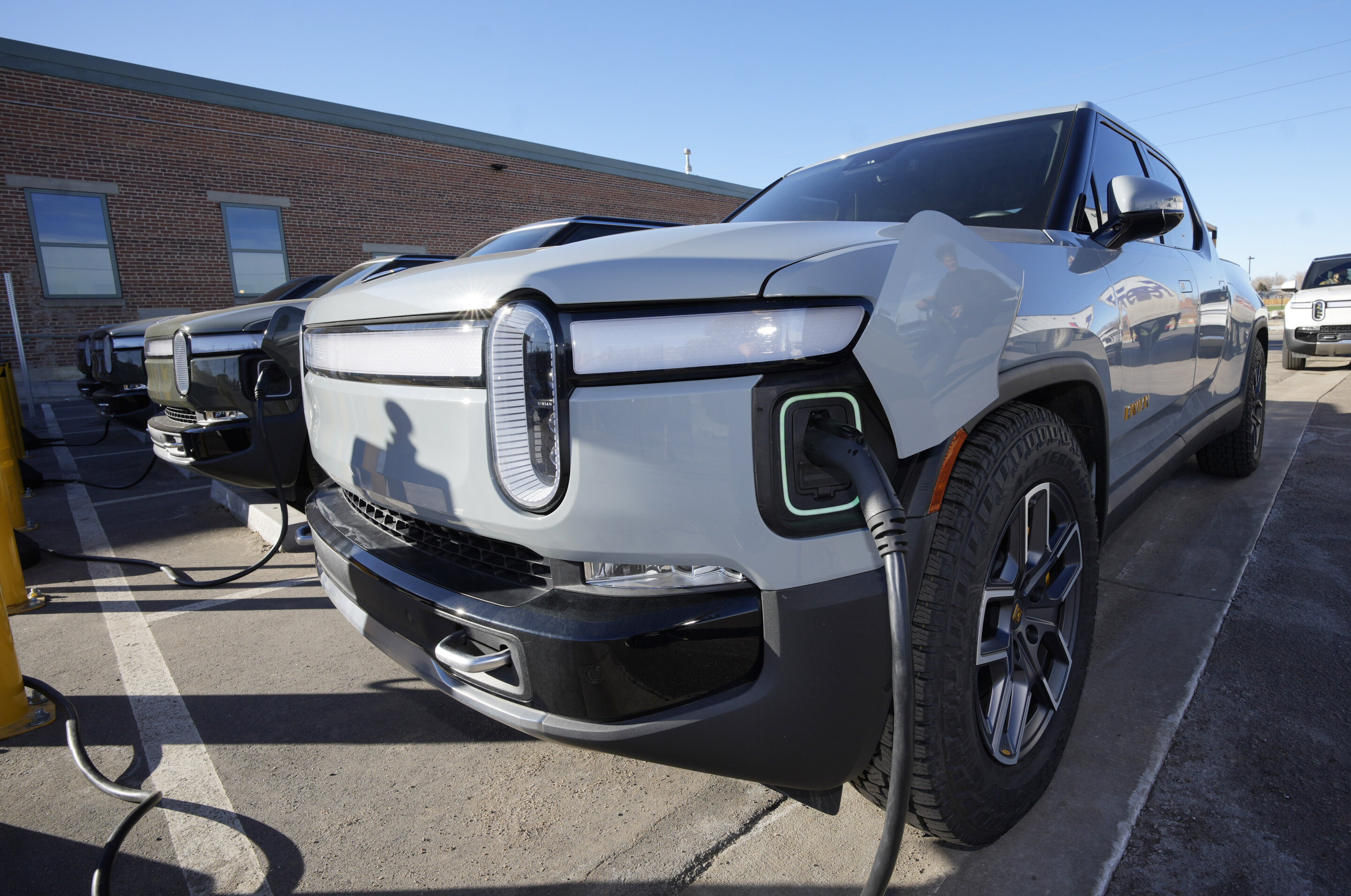 Electric vehicle maker Rivian to join Tesla charging network as automakers consider company’s plug
