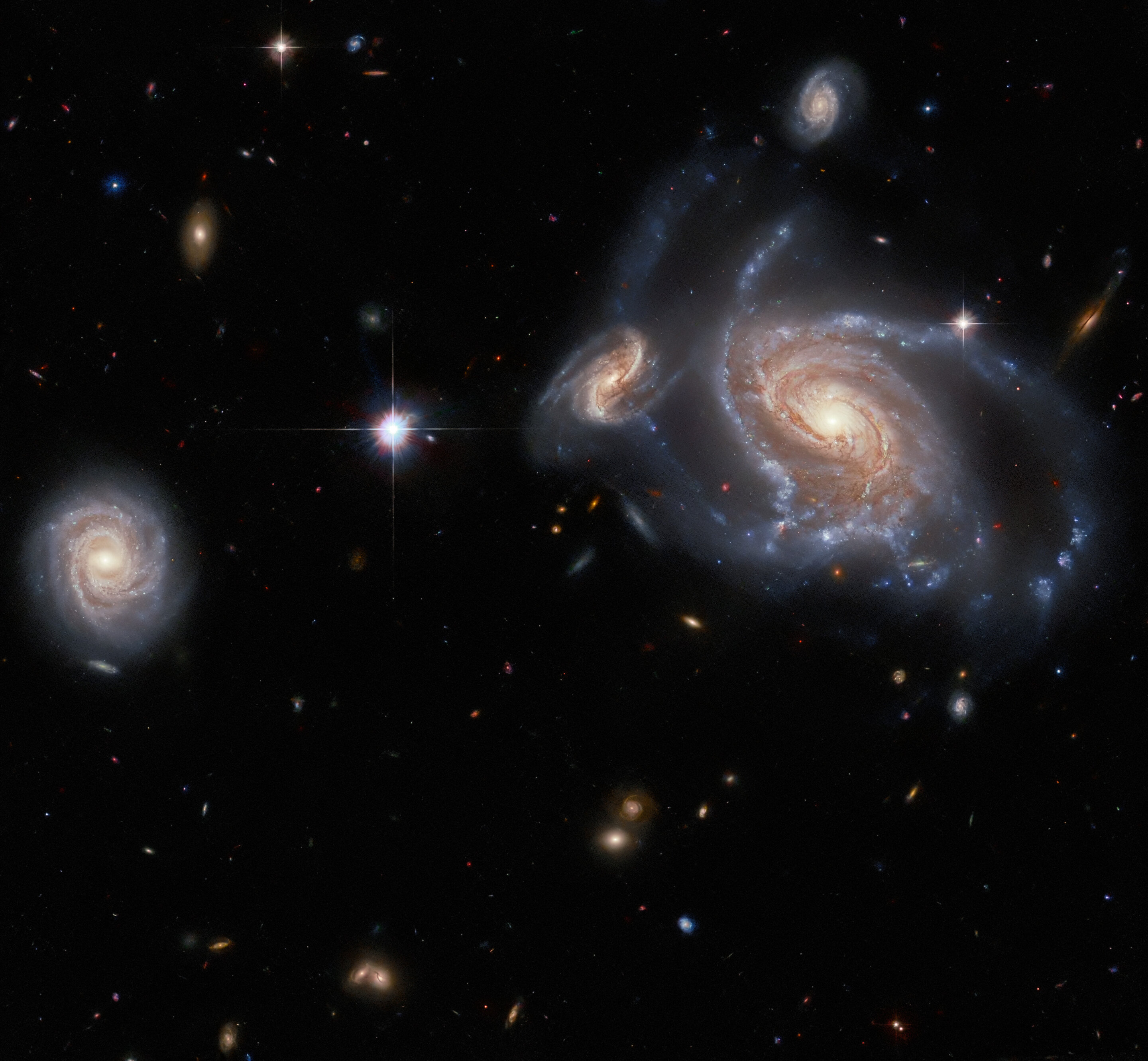 hubble-captures-throng-of-spiral-galaxies