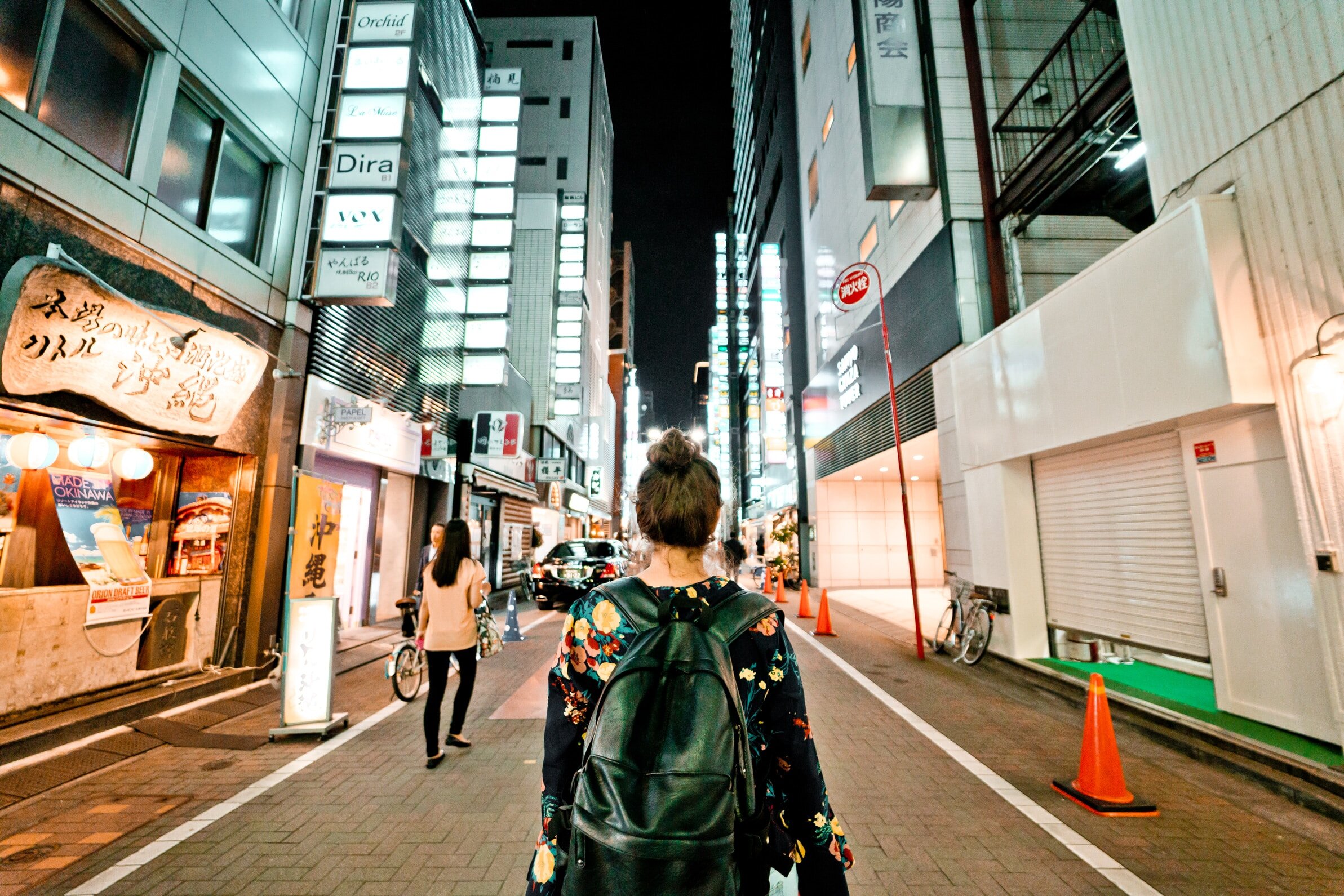 woman walking at night